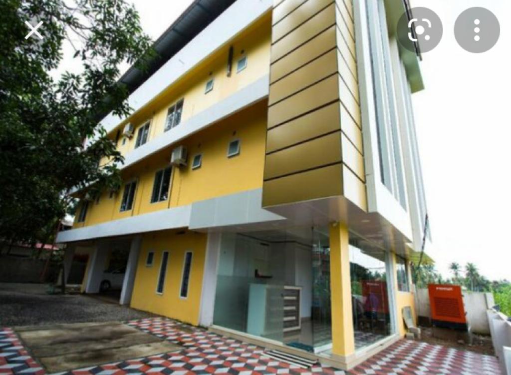 0.500 cent plot with 5800 sqft 15 rooms(12 double & 3 single) lodge sale at Nedumbassery.