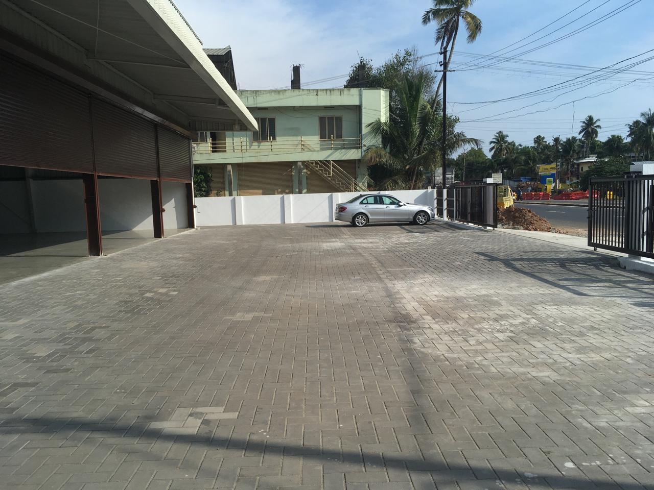 37.5 cent plot with 8750 sqft Showroom for sale at Aroor.